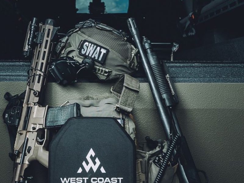 West coast Armor chest plate and rifles in a vehicle
